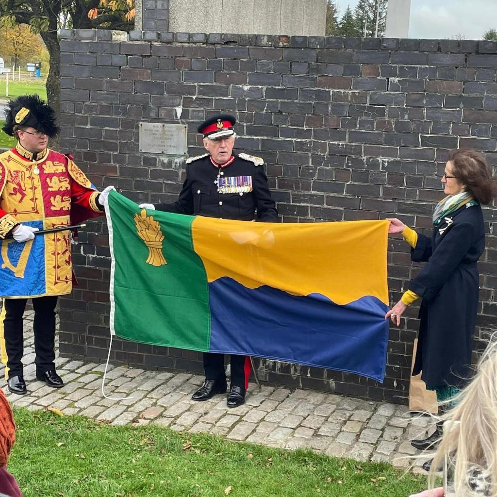 Morayshire Lord Lieutenant holding the County Flag
